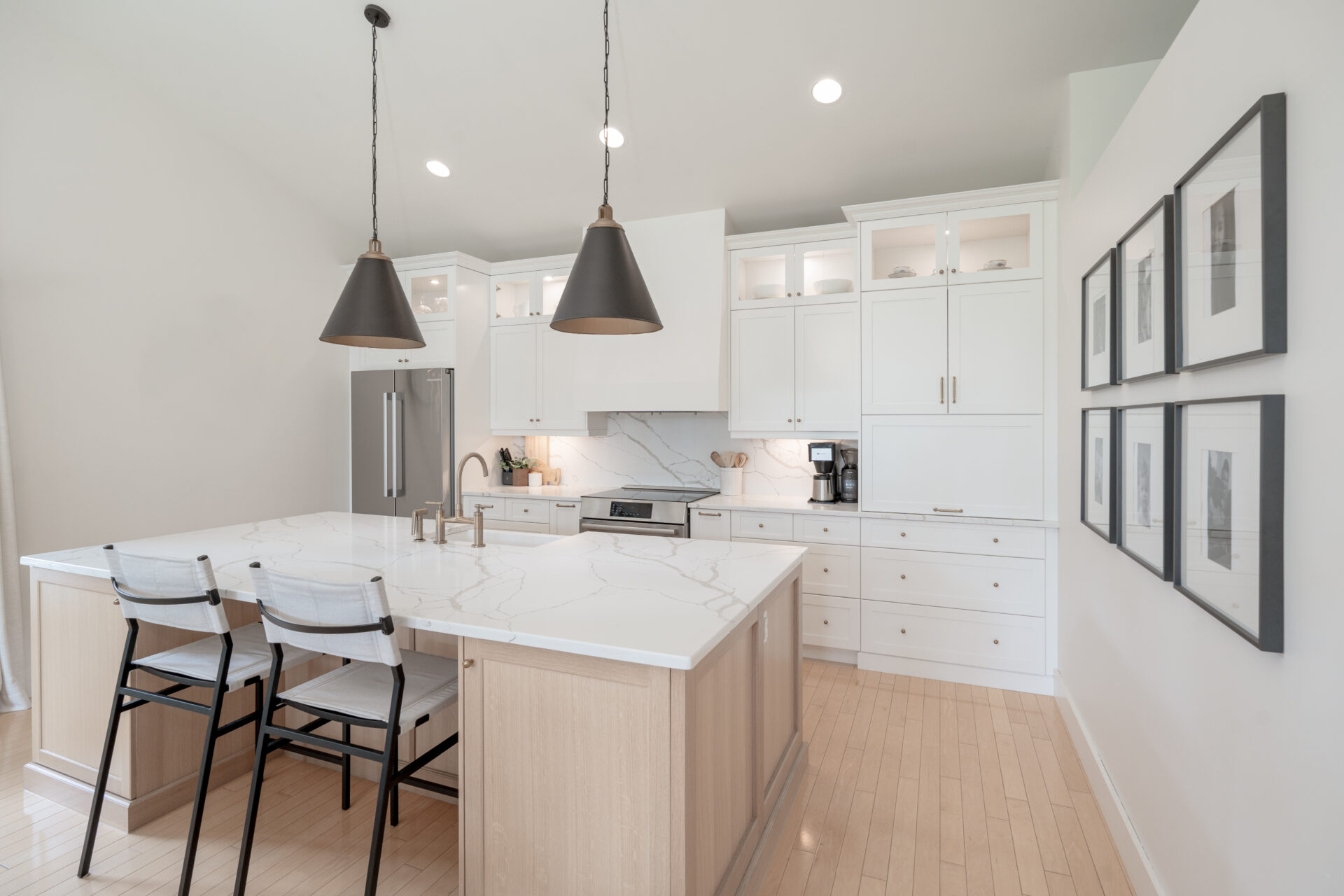 Try Me Cabinets Hi Res-38 Nathan Dyck a kitchen with white cabinets and wood floors